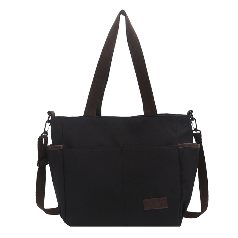 Bolso de lona coreano para mujeres nueva moda ocio de gran capacidad mochila portátil tote simple bolso de hombro para estudiantes