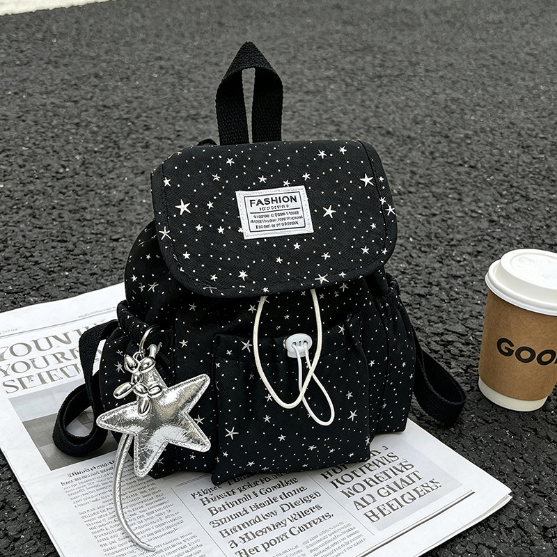Primavera nuevo estilo ins leche de viento bonito joven estrella impresa mochila de hombro para mujeres de alto valor dulce mochila pequeña