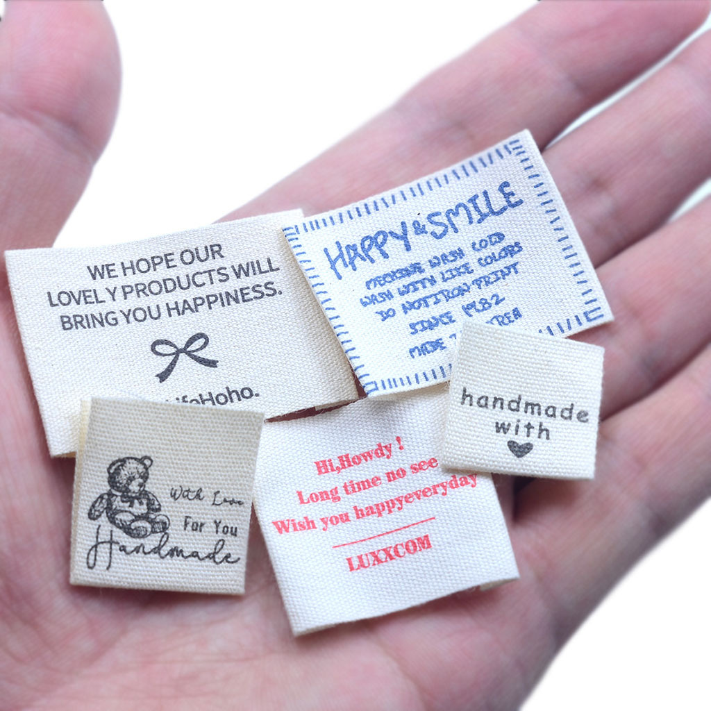 純綿印唄手作りDIY部品プリントアニメ水洗いマーク綿帯子供服織り唄商標卸売り