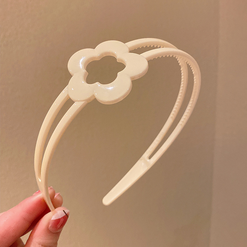 2023 nuevos niños diadema lindo simple color caramelo hueco flor niña horquilla diadema antideslizante no apretado