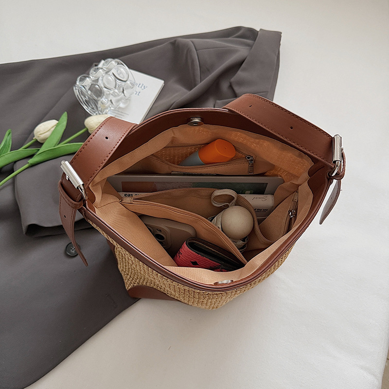 2025 verano nuevo estilo bolso tejido coreano bolso de hombro simple y versátil bolso de axila de gran capacidad bolso de cubo de tendencia de moda