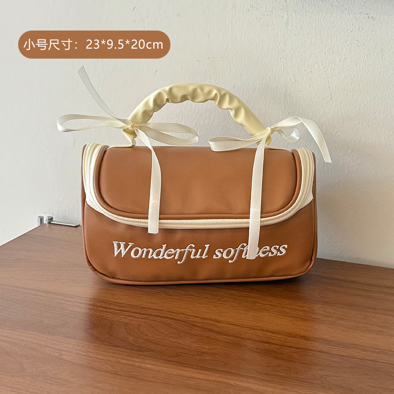 Bolsa de maquillaje de arco de corazón de niña portátil, bolsa de almacenamiento portátil, bolsa de lavado impermeable de gran capacidad