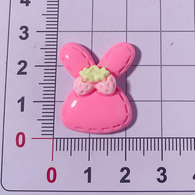 Nuevo color caramelo lindo conejo DIY accesorios de resina crema pegamento para el cabello accesorios para el cabello agujero abrazadera de zapatos agujero material hecho a mano