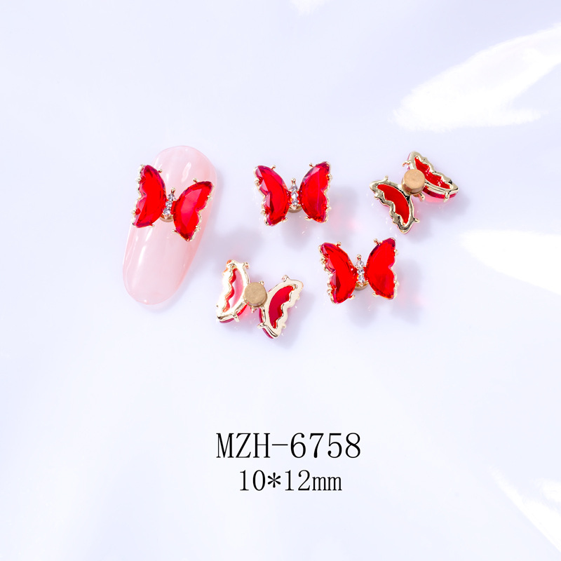 Giratoria de uñas mariposa joyería en línea celebridad tridimensional Rosa cristal alas accesorios DIY mariposa joyería de uñas Taladro