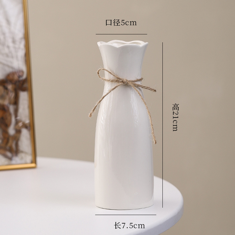 シンプルな現代の満天星陶磁器の花瓶の置物の客間の白い磁器の小さい清新な乾いた花の生け花の創意の陶磁器の花器|undefined
