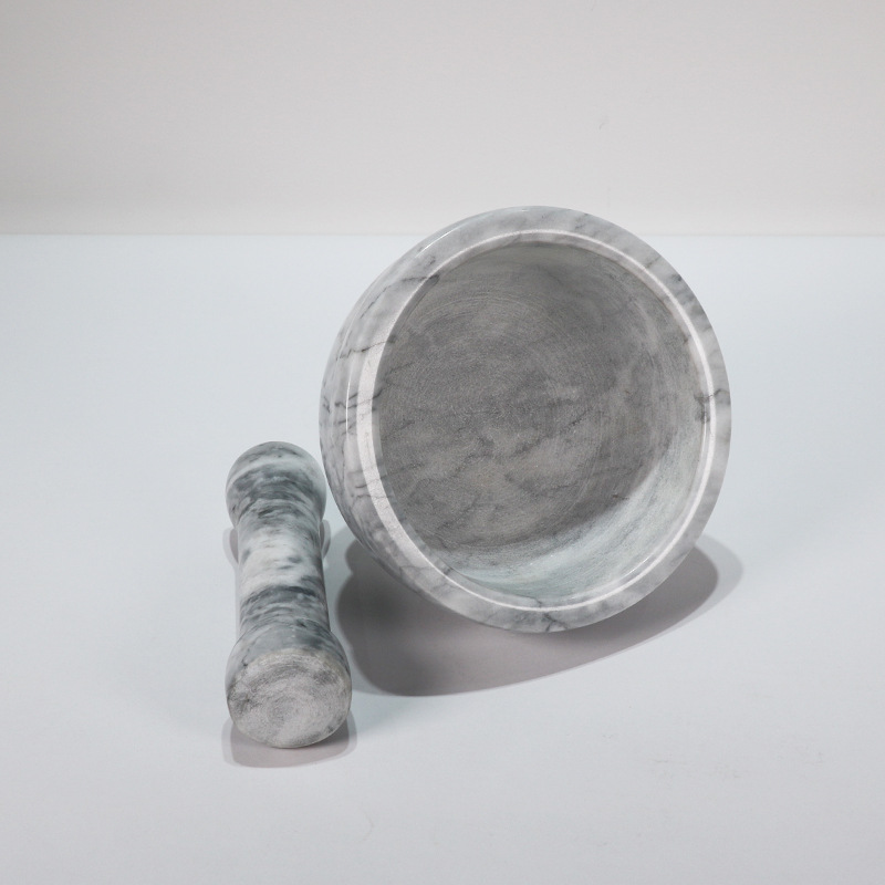 ���������ʯͷ������ʯ�ʼ��õ�����޲��ֶ���ʽ��������ĥ��