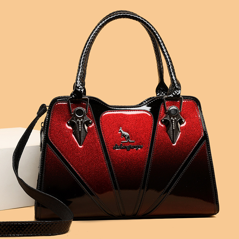 Cross-border 2024 nuevo estilo europeo y americano de alto nivel atmósfera bolsas de mano de mujer lacadas empalmadas bolsas de hombro de mujer