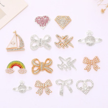 新款diy镶钻彩虹蝴蝶结爱心饰品配件锌合金手机壳美容背贴配饰