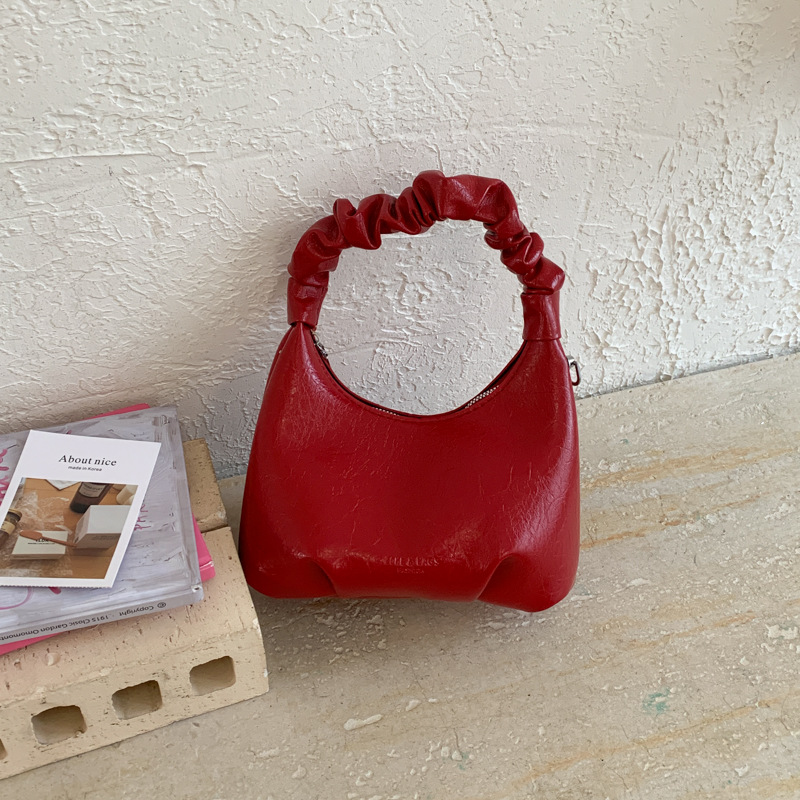 2026 primavera nueva moda temperamento bolso de hombro de moda bolso de arco de moda moda bolso de mano de tendencia diaria plegado mochila