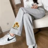 Thin trousers, loose straight fit