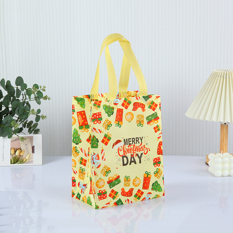 Bolso de Navidad de punto transfronterizo, bolsa de embalaje de regalo, bolsa no tejida laminada en caliente plegable portátil personalizada