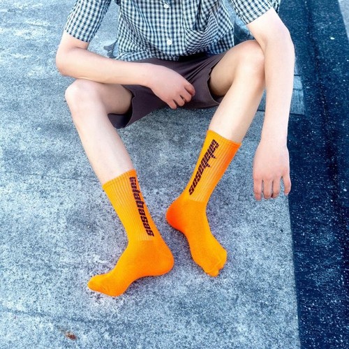 Socks men's autumn and winter ins trendy socks European and American couples mid-calf socks coconut white letter basketball socks Kanye's same style