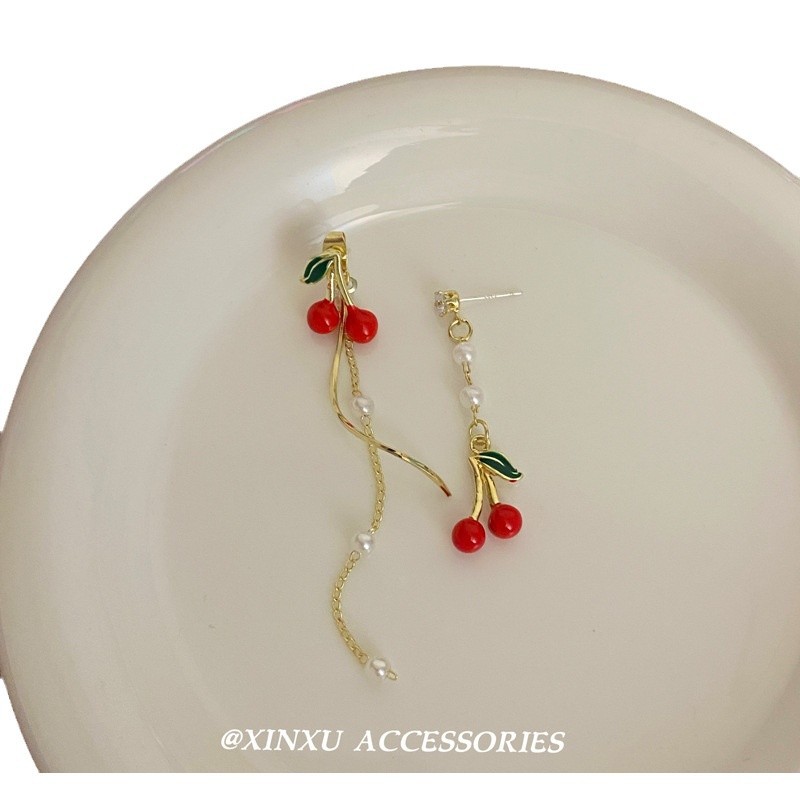 Demi-season red asymmetrical small design long earrings with tassels