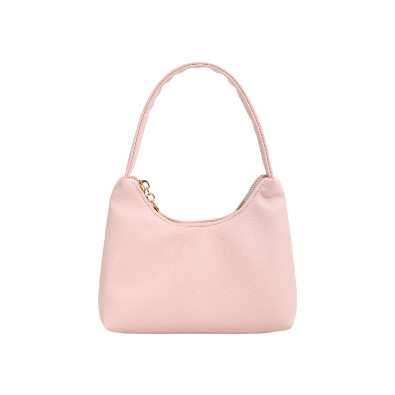 Nuevas bolsas de niños transfronterizas, bolsas de cambio de moda coreana de litchi para hombres y mujeres, bolsas de media luna de color sólido.