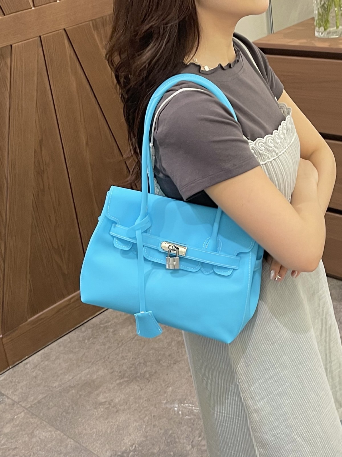 Bolsa de gelatina de gran capacidad para mujeres verano de 2026 nueva moda de dopamina Kelly bolso de moda coreano bolso de tote