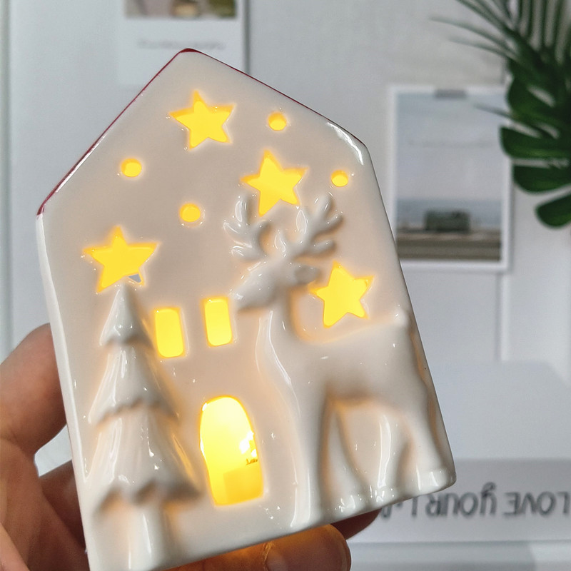 Decoración de cerámica de casa pequeña con luz transfronteriza estilo nórdico Navidad estilo caliente decoración navideña decoración de mesa noche