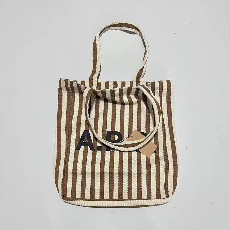 APC striped letter canvas tote bag, large capacity, shoulder bag, handbag, student shopping bag, artistic and vintage style
