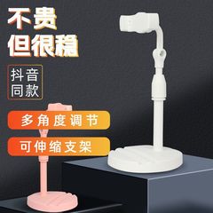 携帯電話のスタンドの神器のデスクトップの回転は昇降して写真を撮ることができます。