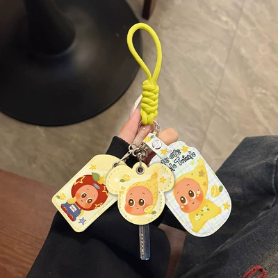 Electric vehicle key cover shell: Soft Cartoon Three-Piece Set Key - three-card-holders-yellow-key-rope-lemon-star