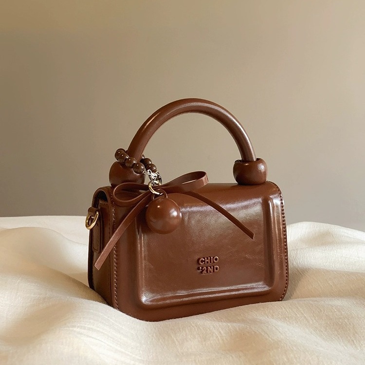Nanfeng Chio2nd Sweet Paradise Small Square B, a niche designer's exquisite hand-held b, single shoulder crossbody_voghion.com