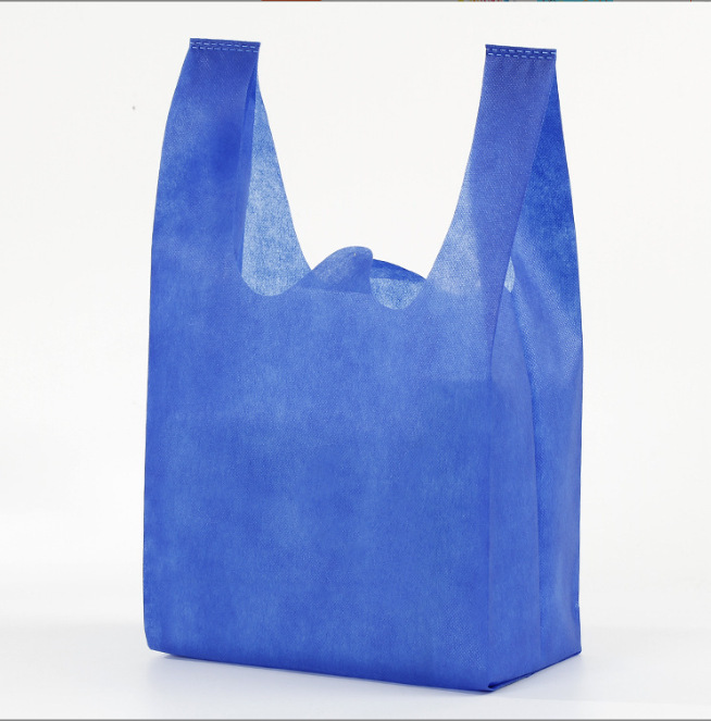Bolsas de tela no tejida en stock bolsas de compras bolsas de chaleco impresión en color logotipo y patrón publicitario bolsas ecológicas