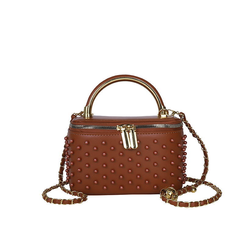 Caja de mano de alta sensación, bolso cuadrado pequeño para mujeres 2026 nueva moda transfronteriza nicho de moda ligero de lujo cadena mochila
