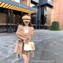 欧品の両面のウールのコートは中の長いコートと帽子の中のプリントの洋風のゆったりしている気質の秋冬の新型を結びます。