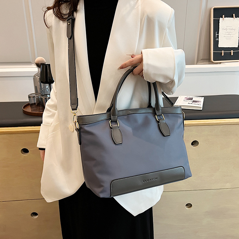 2024 transfronterizo nuevo nylon bolso de mano casual gran capacidad de color retro viaje mochila de hombro