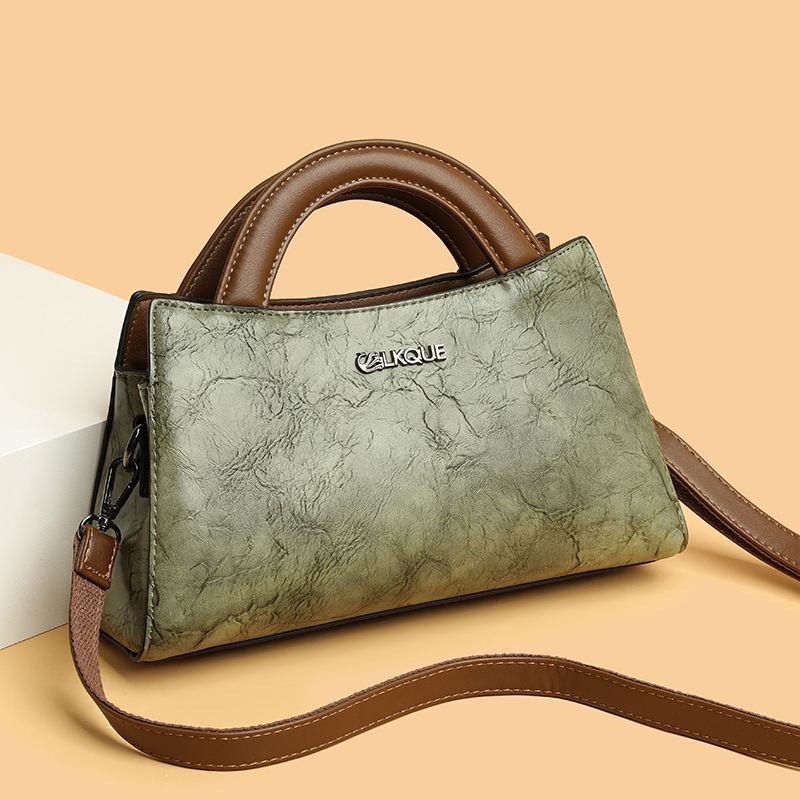 G5U真皮女包复古斜跨包2024新款牛皮高级感中年妈妈单肩包时尚旗