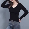 Black long-sleeve, V-neckline