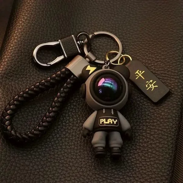 Car Pendant Astronaut Keychain Cartoon Astronaut Bag Couple Keychain Luminous Doll Zinc Alloy