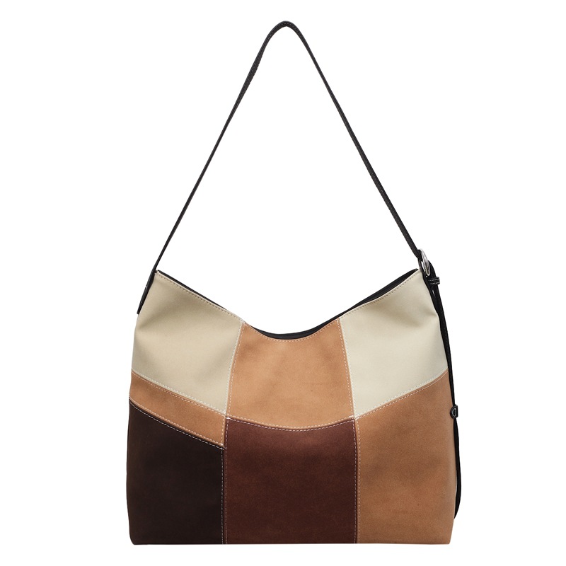 Bolsa de mujer de gran capacidad de hombro bajo la axila venta caliente nueva textura de alta calidad nicho coreano empalme bolso especial