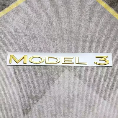 Tail Badge, New 3Y Tailgate: Car logo - replacement-pack-comes-with-adhesive-backing-goldmodel3english