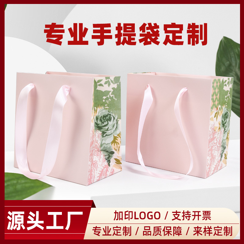 工厂直销粉色服装手提袋服饰袋手挽礼品袋子小批量纸袋批发可降解