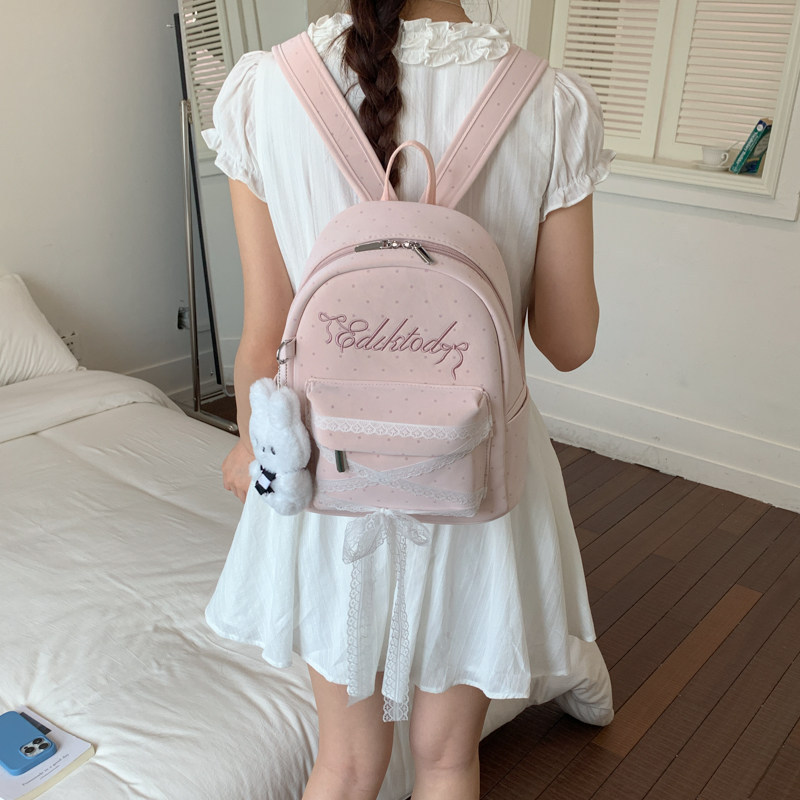 Mochila de letras onduladas para mujeres 2026 nuevo arco de encaje dulce mochila diaria mochila de verano ligera