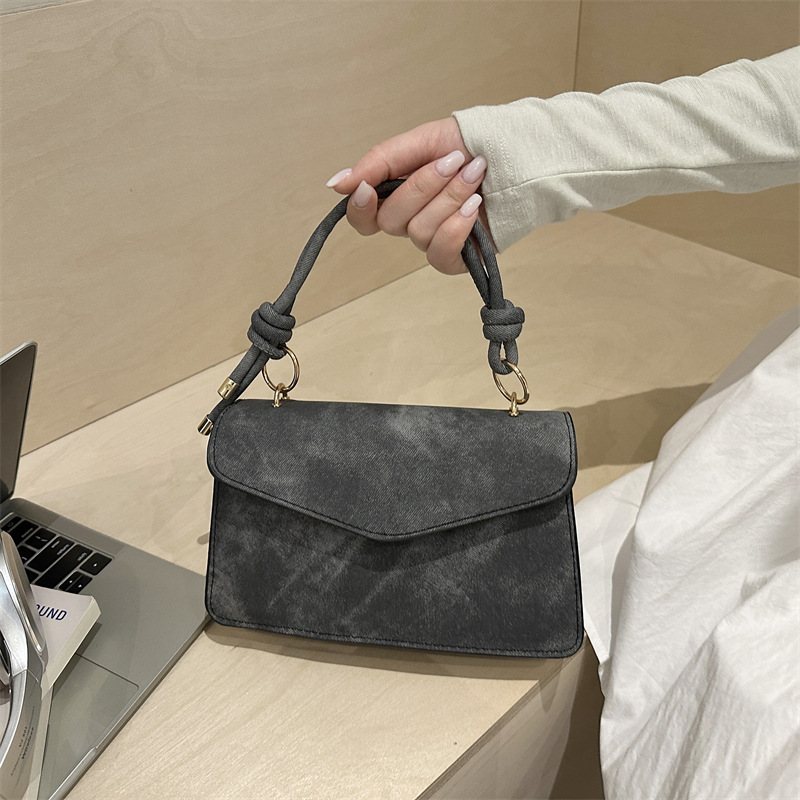 Bolso público pequeño para mujeres 2026 nuevo bolso cuadrado de alta calidad sensación de diseño retro bolso de hombro simple bolso de mano