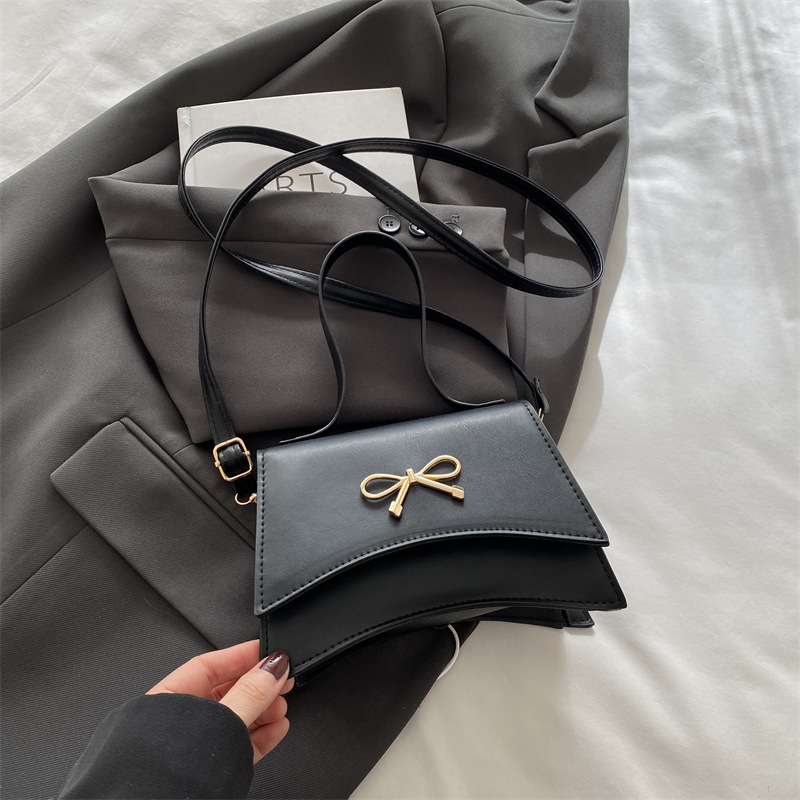 Nuevo diseño de nicho bowknot moda color sólido ins bandolera simple bandolera estilo occidental suave pequeño bolso cuadrado
