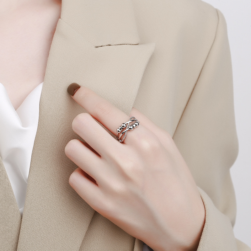 Carlyle moda inteligente de Europa y América personalidad simple de doble capa Cruz bobina nicho anillo giratorio joyería femenina al por mayor