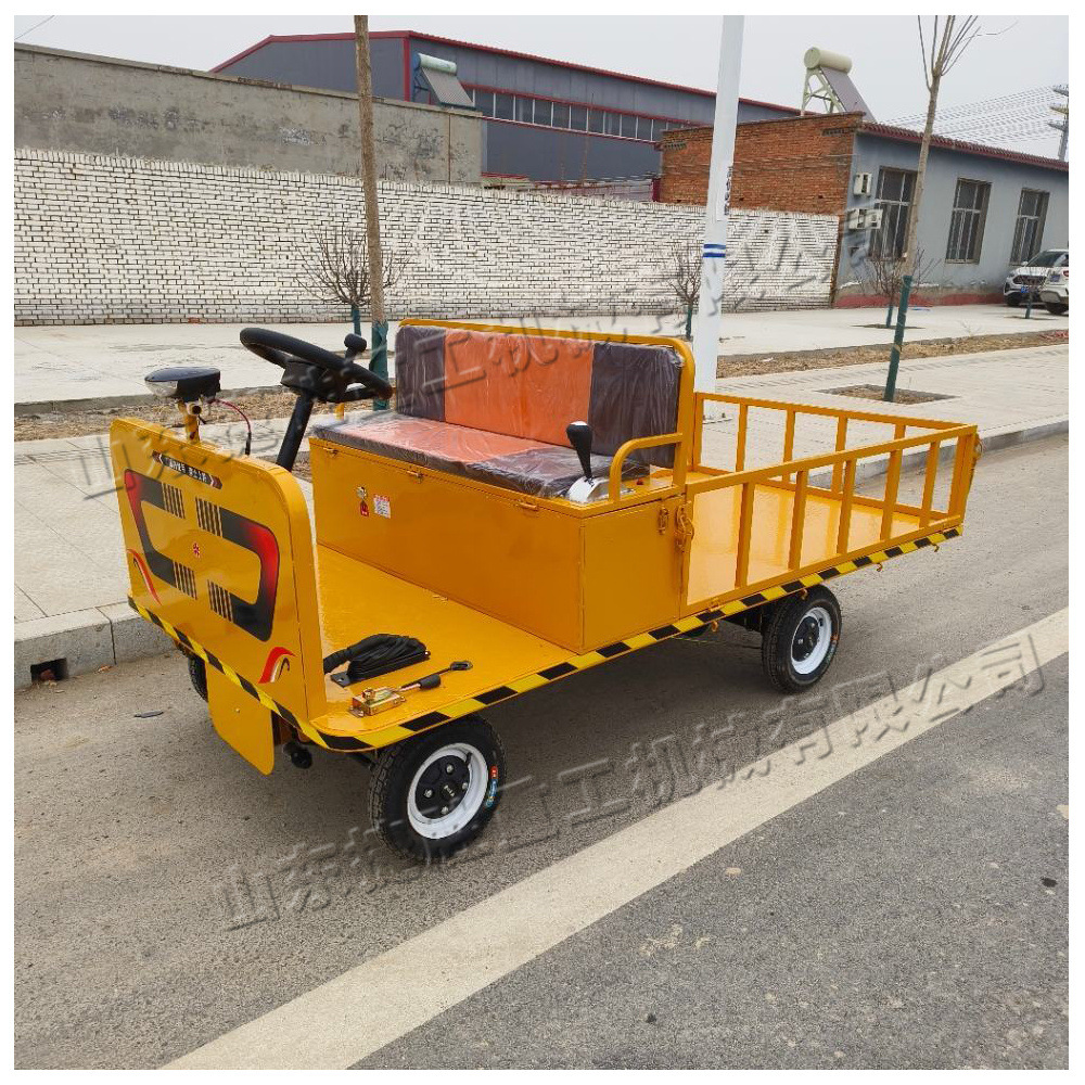 Vehículo de transporte de placa plana eléctrica pequeña de carretera estrecha tipo vehículo de herramientas de asiento de taller de fábrica de carga