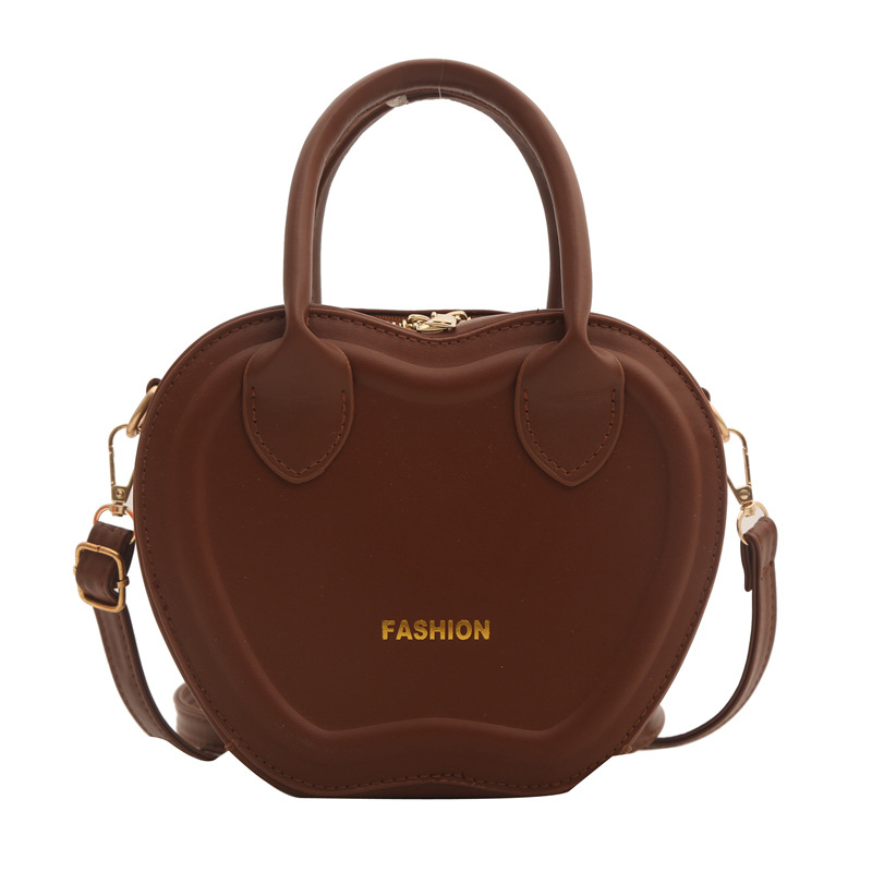 Bolso de mujer 2024 verano nuevo bolso de moda empujada textura PU bolso de hombro simple color sólido mochila de viaje