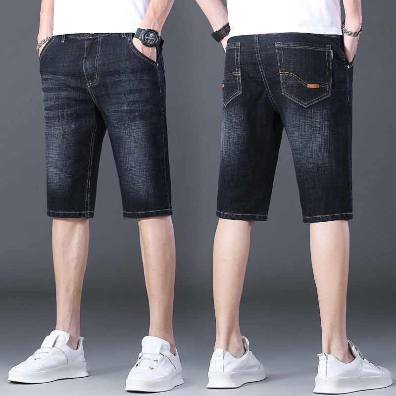 夏の薄いタイプの7分のズボンの男性のまっすぐな筒の紳士服のデニムのショートパンツの弾力性は夏の青年の中でズボンを修理します。|undefined