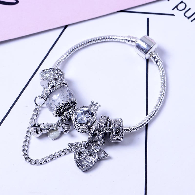 Bracciale donna perle occhio di gatto ali angelo e orsetto_voghion.com