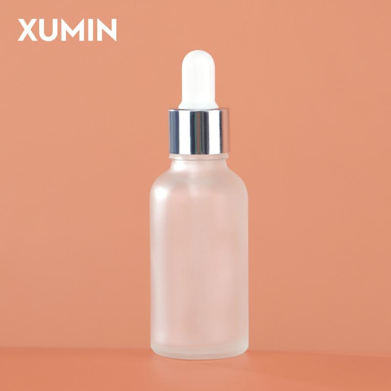 Embalaje cosmético botella de vidrio esmerizada botella de gotas líquidas de hombro redondo anillo de aluminio eléctrico botella de aceite esencial 30ml