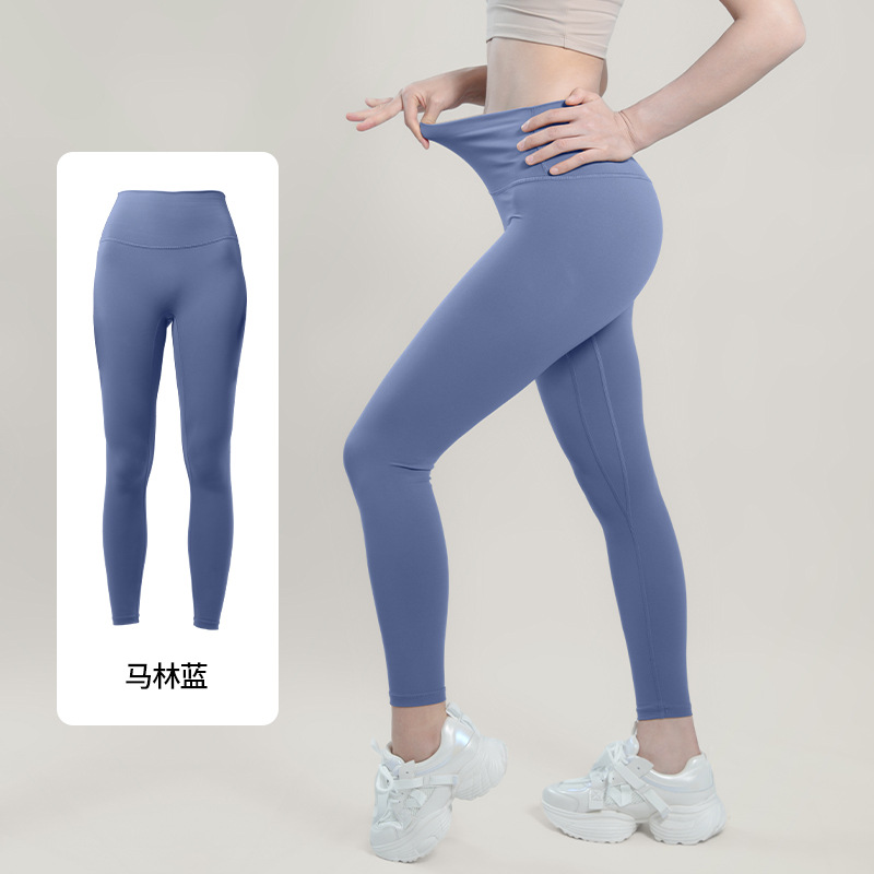 Primavera y otoño pantalones de yoga secado rápido cintura alta sin líneas embarazosas leggings de yoga entrenamiento deportivo pantalones de nueve puntos