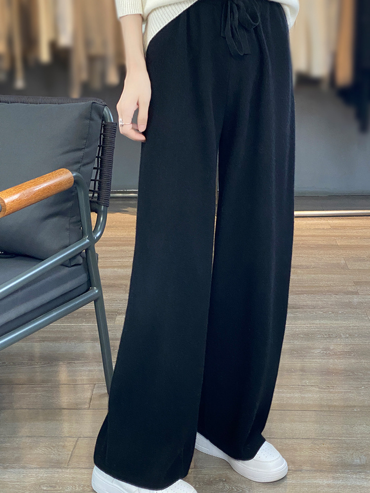 ウールのズボンの女性の秋冬の新型の純色の自然な腰のメリヤスは厚い広腿のズボンのカジュアルな垂感を厚くします。