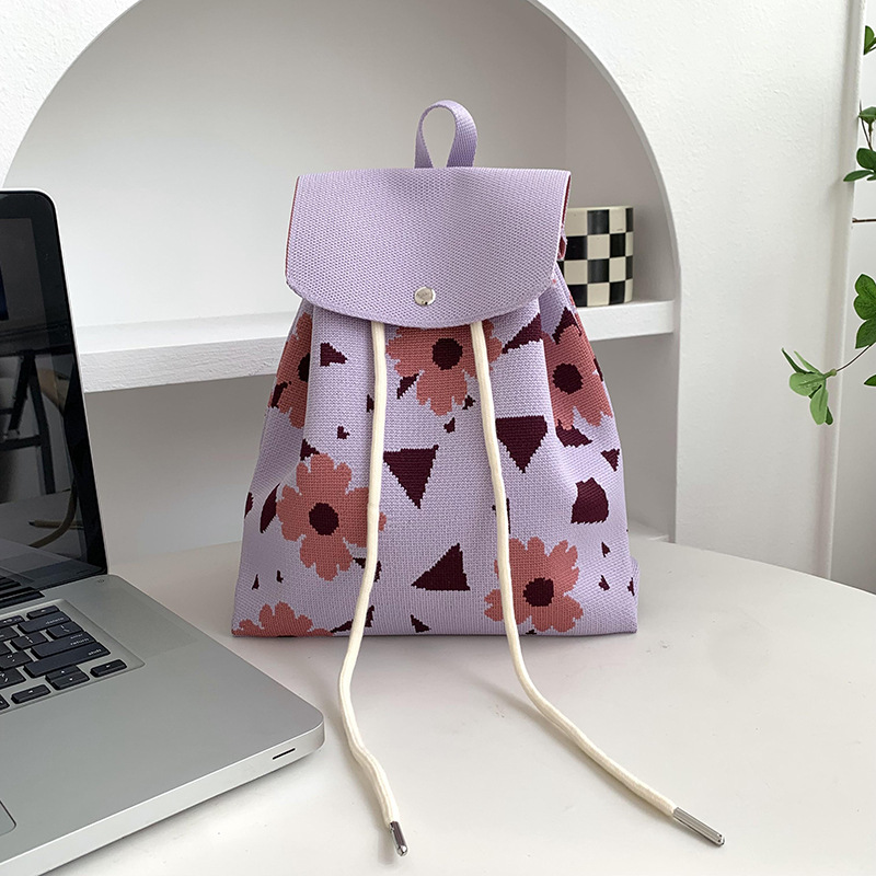 Mochila de alta calidad para damas nueva personalidad de dibujos animados versátil de gran capacidad de viaje bolsa de tejido portátil mochila de punto