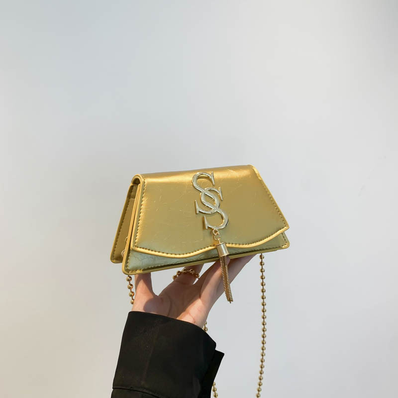 Bolso de tendencia de mujer cadena retro hombro simple letras de moda 2025 primavera nuevo mini mochila bolso pequeño