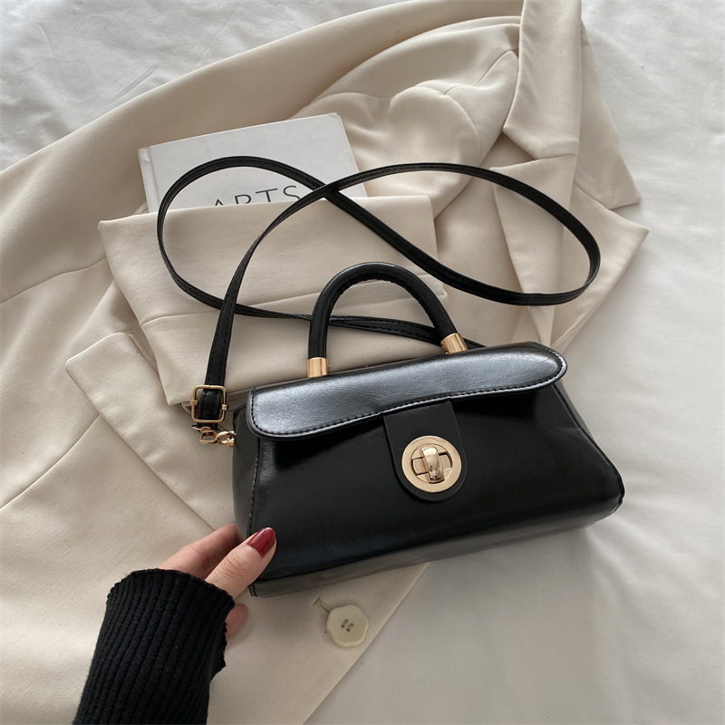 Retro simple bolso de mujer 2024 otoño invierno nuevo bolso de mano cuadrado de estilo exterior versátil alta textura mochila