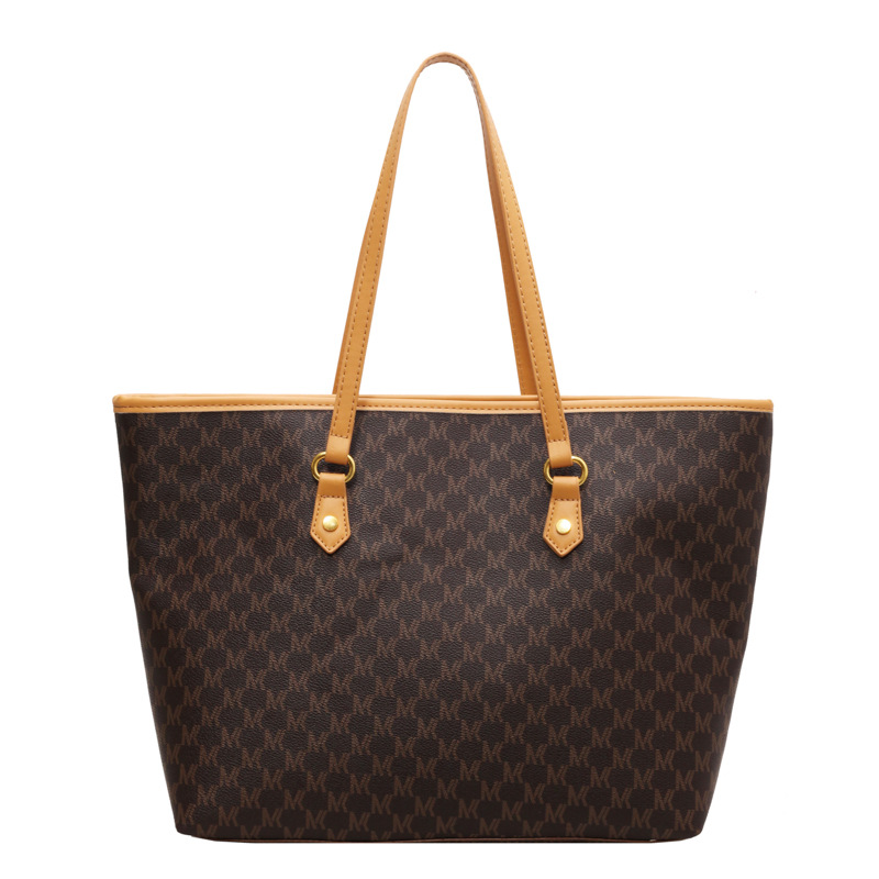 Bolsa de gran capacidad de dama de alta calidad 2025, nuevo tipo de bolso de hombro versátil, bolso de mano de viaje retro de moda