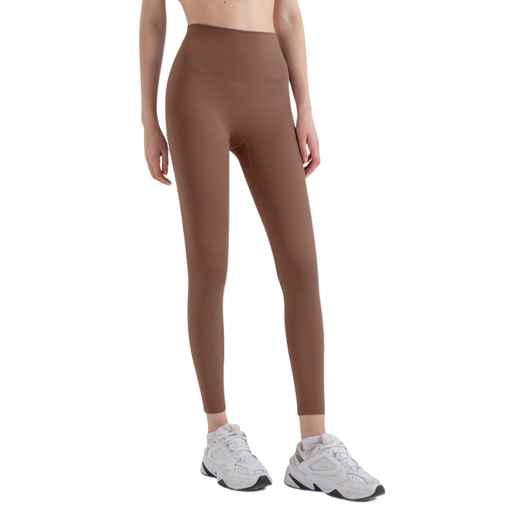 Nuevos deportes de yoga cintura alta desnuda sensación de no vergüenza línea piel-friendly levantamiento de la cadera del vientre que no se contrae la caída de la aptitud de las mujeres pantalones recortados